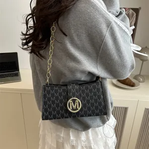 French chic shoulder bag with M letter pattern, gold chain and metal buckle logo