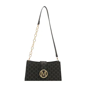 French style black underarm bag with M-letter print and gold metal logo hardware