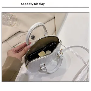 Capacity display of white faux crocodile pattern shell bag with phone and lipstick inside