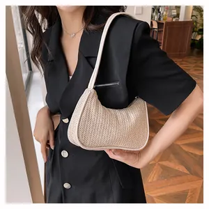 Detail of beige woven hobo shoulder bag featuring intricate V-pattern texture for summer