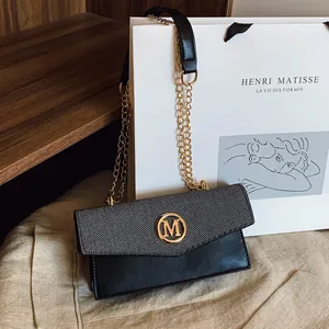 Women's Trendy PU Leather Small Square Crossbody Bag With Gold Chain Strap Contrast Color Stitching Fashion M Logo Bag