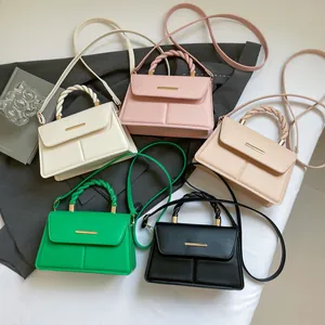 Woven handle small square crossbody bags in five colors on a professional background