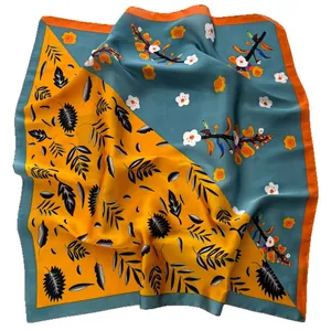 70cm square silk scarf with floral leaf patterns in yellow and blue-green hues