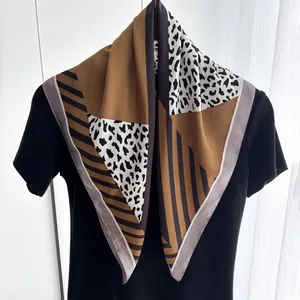 Square silk satin scarf featuring leopard print and geometric color block design