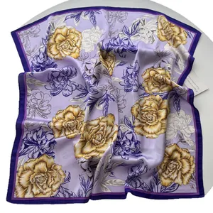 Elegant purple silk scarf with large yellow peony print and decorative border