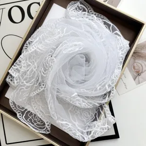 White camellia lace bridal shawl with floral embroidery and scallop edge detail