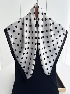Detail of vintage black polka dot cotton linen scarf with elegant wide border