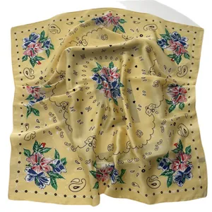 Yellow paisley and floral pattern square silk scarf with soft satin texture