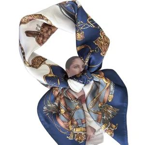 Polka dot silk scarf with royal blue and gold nautical chain and buckle patterns