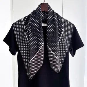 Elegant black and white polka dot silk scarf for women featuring a minimalist square design