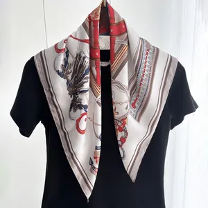 Detail of luxury chain print silk scarf with nautical rope patterns on satin fabric