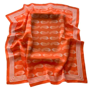 Classic bright orange paisley satin square scarf with geometric border on white background