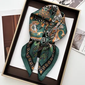 Vintage emerald paisley square silk scarf folded in a luxury gold frame gift box