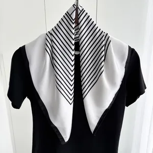 Minimalist square silk scarf with geometric black and white stripes and black borders
