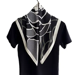 Black and white geometric square silk scarf with abstract leaf patterns and fine mesh design