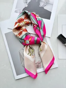 Detail of a chic silk scarf with chain pattern on a fashion magazine background