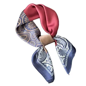 Elegant paisley patterned satin square scarf with red blue and gold colors on white background