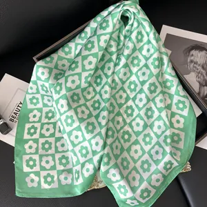 70cm silk satin scarf with green checkerboard and daisy floral print on black background