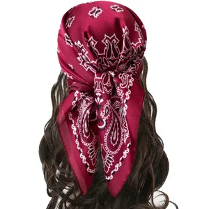 Silk texture burgundy paisley bandana tied on hair with vintage satin finish print