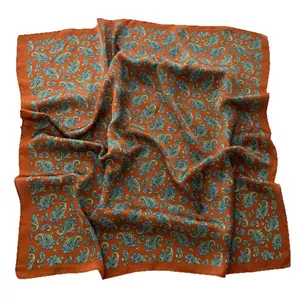 Caramel paisley silk-like square scarf with blue patterns and elegant drape for women