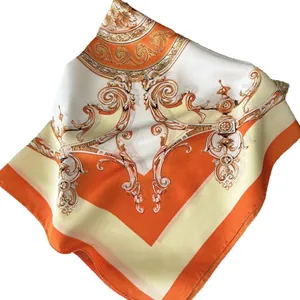 Elegant baroque square silk scarf with orange and beige floral patterns on white background
