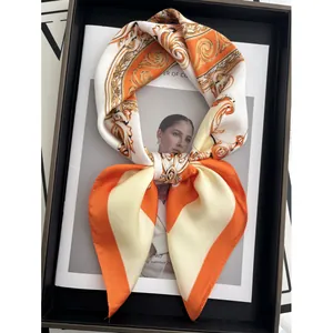 Elegant silk-like square scarf with gold baroque floral pattern and satin finish