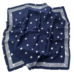 Elegant navy blue silk square scarf with white polka dots and textured white border