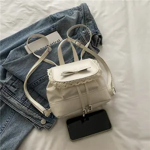 Mini sac à dos crème chic avec dentelle, nœud et bretelles réglables pour femme