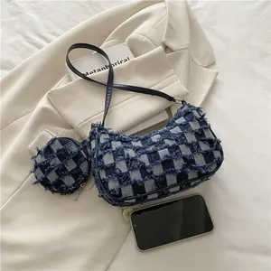 Blue and white checkered hobo bag with denim fringe and matching coin purse