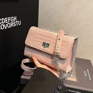Pink crocodile pattern square bag with silver chain strap and metal turn-lock