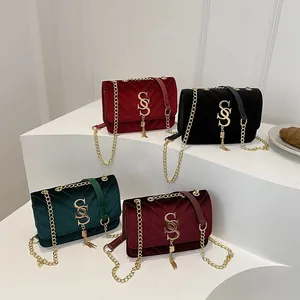 Quilted velvet chain crossbody bags with metal logo in red, black, green and burgundy