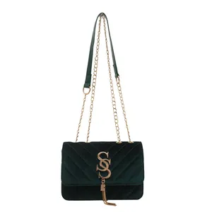 Elegant dark green velvet quilted chain square bag with gold tassel and metal logo