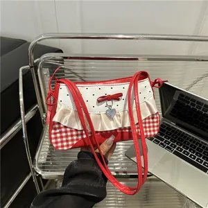 Japanese sweet bow shoulder bag with red and white checkered pattern and heart charm