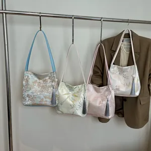 New Chinese style jacquard hobo bag with bamboo leaf patterns and grey tassel charms