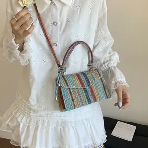 Colorful striped woven straw crossbody bag with top handle and flap for summer beach wear