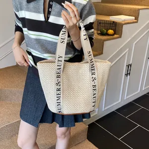 Chic cream straw tote bag with Summer & Beauty straps for beach and commuting