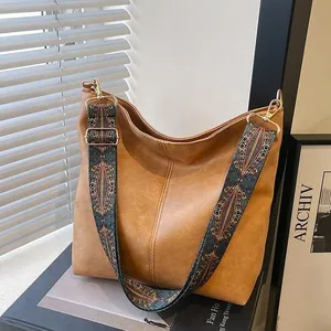 Brown large capacity tote bag with vintage geometric woven wide shoulder strap