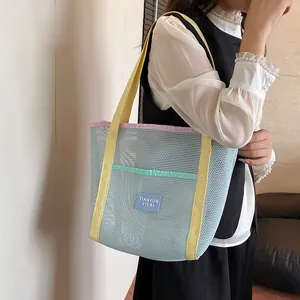 Summer mesh tote bag with colorful patchwork design for beach travel and shopping