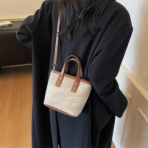 Retro-Eimertasche aus Canvas und PU-Leder mit Griff und verstellbarem Schultergurt