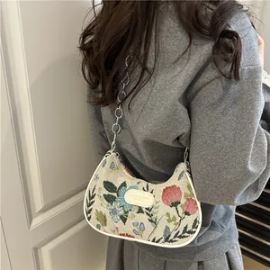 Floral jacquard baguette bag with silver chain strap and stylish flower pattern