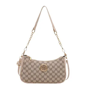 Fashionable beige underarm bag with monogram print and golden metal M logo