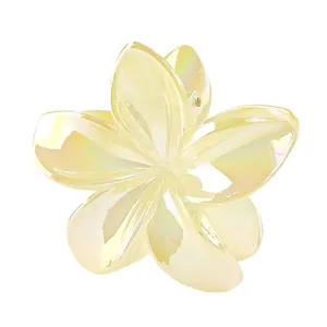 Detail of 8cm plumeria hair claw clip with yellow laser iridescent pearlescent finish