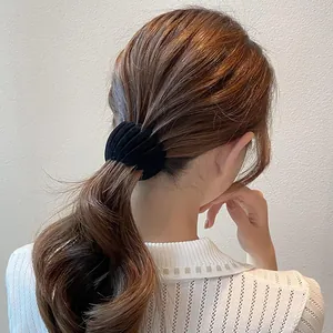 Pince à cheveux nid d'oiseau floquée noire élégante pour chignon et queue de cheval