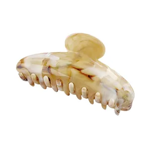 Elegant amber marble acetate hair claw clip with large teeth for women's daily hair styling