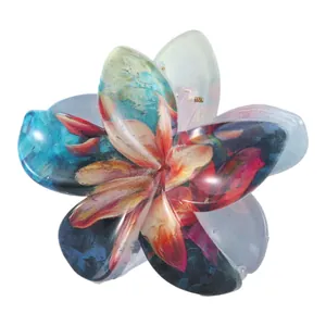 Detail shot of 8cm floral hair claw clip featuring colorful oil painting petal patterns