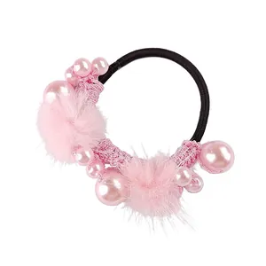 Pink faux pearl and pom-pom hair tie with elastic black band for women styling