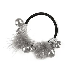 Elastic hair tie with grey faux fur pom pom and glossy pearl bead for women
