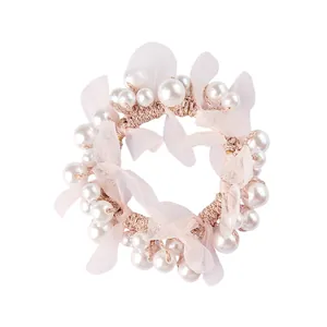 Élastique à cheveux rose avec nœud en tulle et perles pour coiffures de femmes