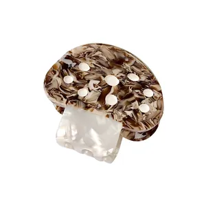 Pince à cheveux champignon créative avec motif écaille marron et pois blancs