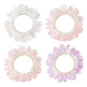Set of 4 iridescent shell petal hair ties with pearls in white, pink, orange, and purple